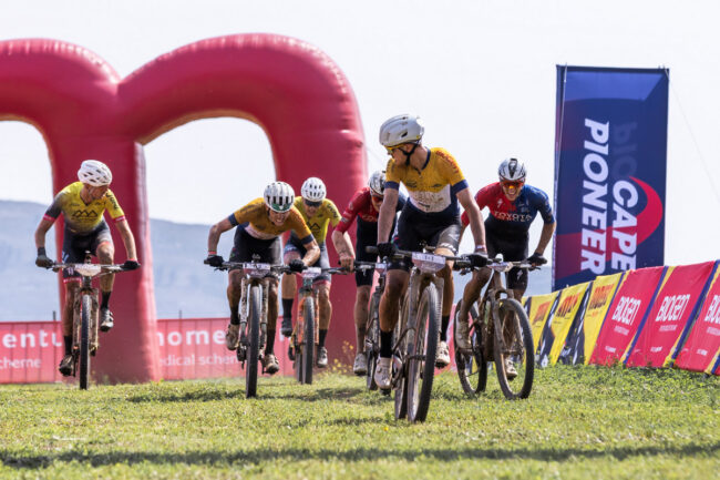 Marc Pritzen (leading) looking on as Felix Stehli (left), Lood Goosen (centre behind Pritzen), and Ignatius du Preez (right) surge for the Stage 2 finish line. Photo by Oakpics.com.